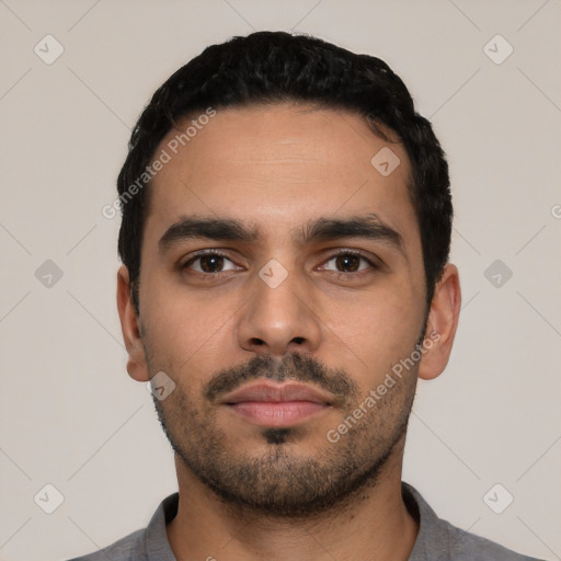 Neutral latino young-adult male with short  black hair and brown eyes