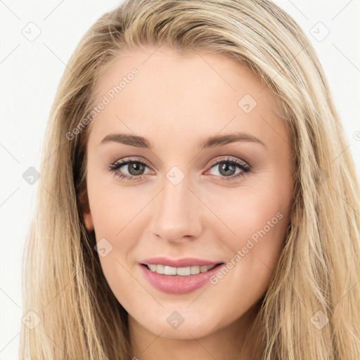 Joyful white young-adult female with long  brown hair and green eyes