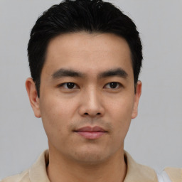 Neutral asian young-adult male with short  black hair and brown eyes