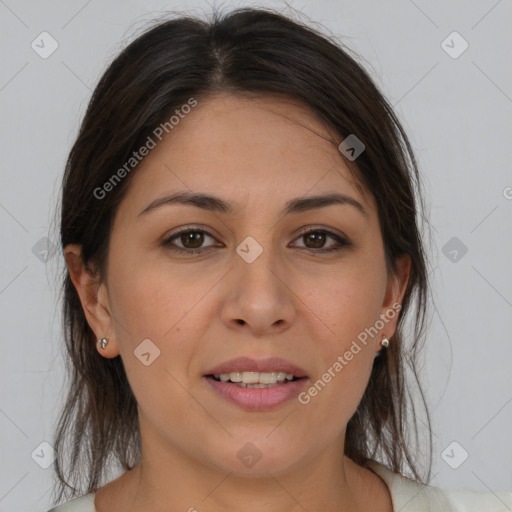 Joyful white young-adult female with medium  brown hair and brown eyes