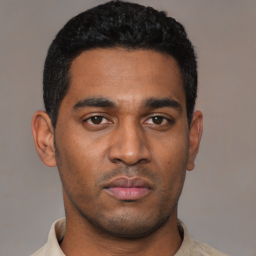 Neutral latino young-adult male with short  black hair and brown eyes