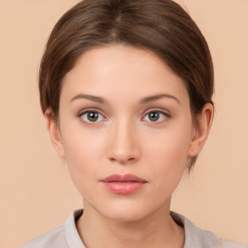 Neutral white young-adult female with medium  brown hair and brown eyes