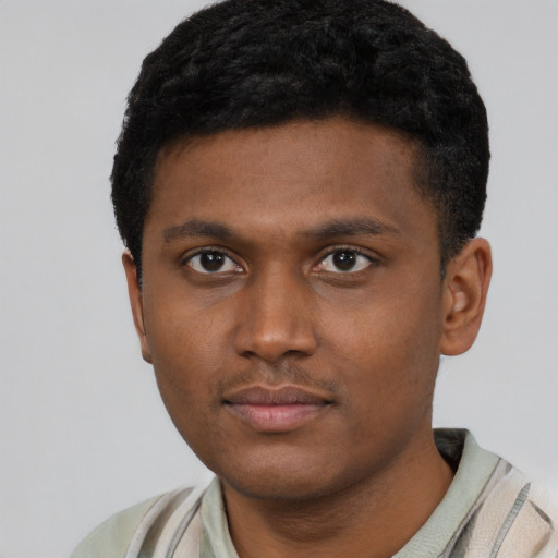 Neutral black young-adult male with short  brown hair and brown eyes