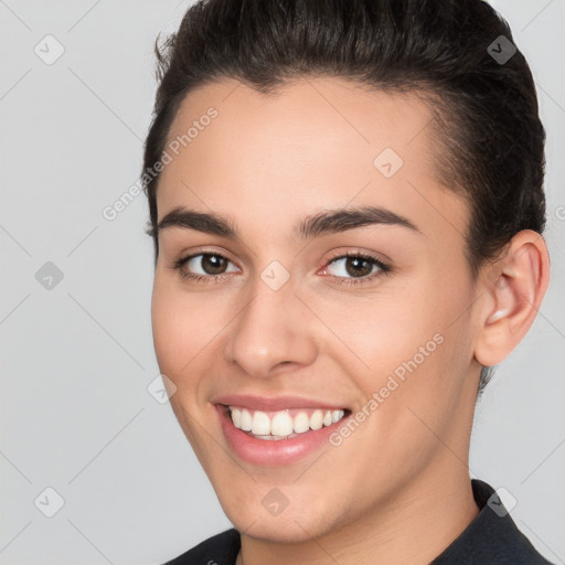 Joyful white young-adult female with short  brown hair and brown eyes