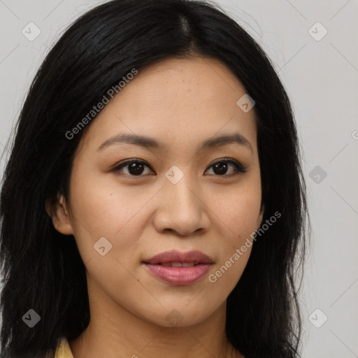 Joyful latino young-adult female with long  brown hair and brown eyes