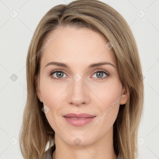 Joyful white young-adult female with long  brown hair and green eyes