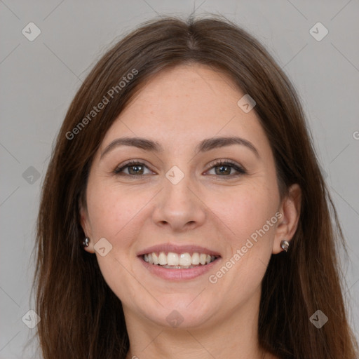 Joyful white young-adult female with long  brown hair and grey eyes