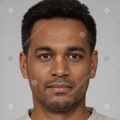 Neutral latino young-adult male with short  black hair and brown eyes