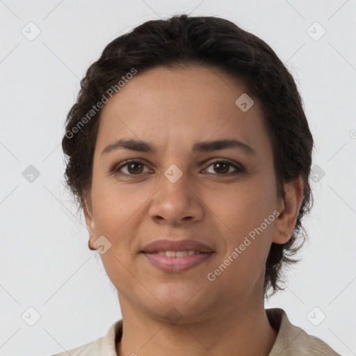 Joyful latino young-adult female with short  brown hair and brown eyes