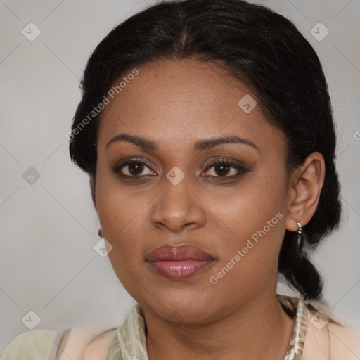 Joyful black young-adult female with medium  brown hair and brown eyes