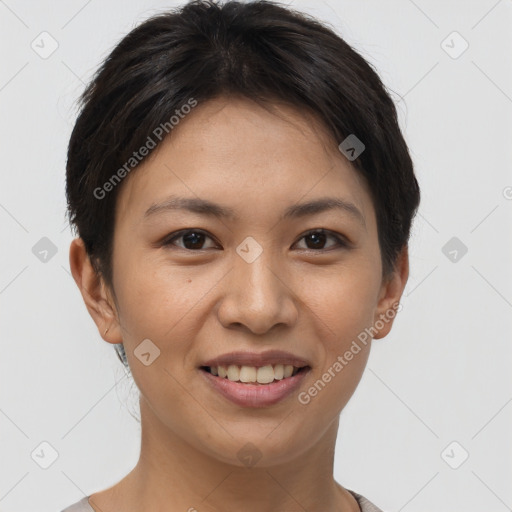 Joyful asian young-adult female with short  brown hair and brown eyes