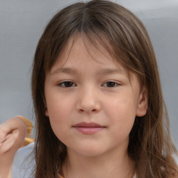 Neutral white child female with medium  brown hair and brown eyes