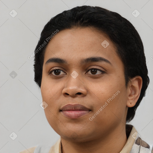 Joyful latino young-adult female with short  black hair and brown eyes