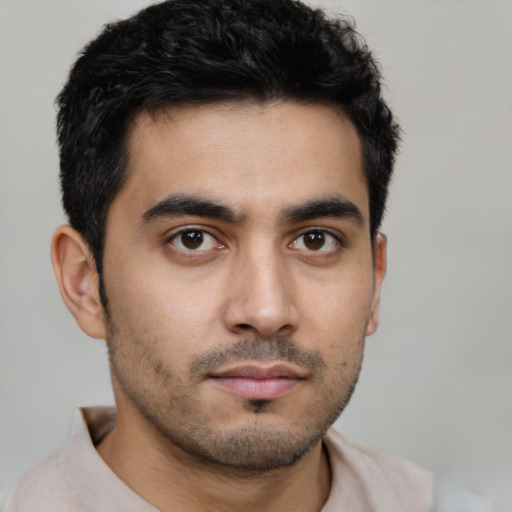 Neutral latino young-adult male with short  black hair and brown eyes