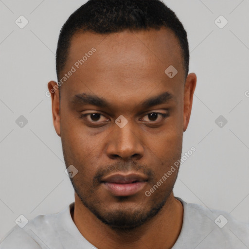 Neutral black young-adult male with short  black hair and brown eyes