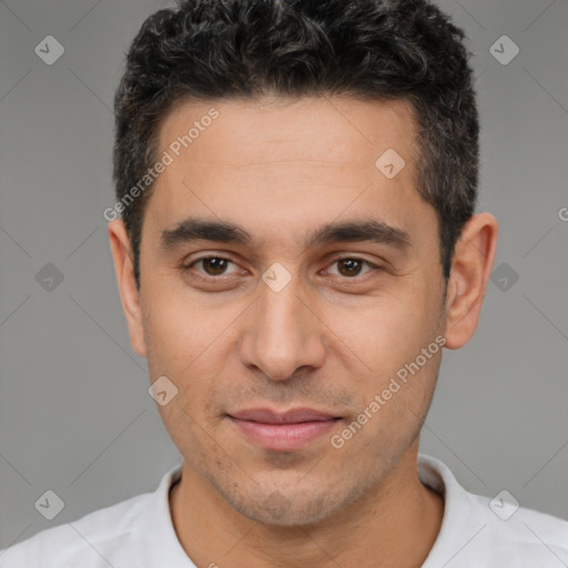 Joyful white adult male with short  brown hair and brown eyes