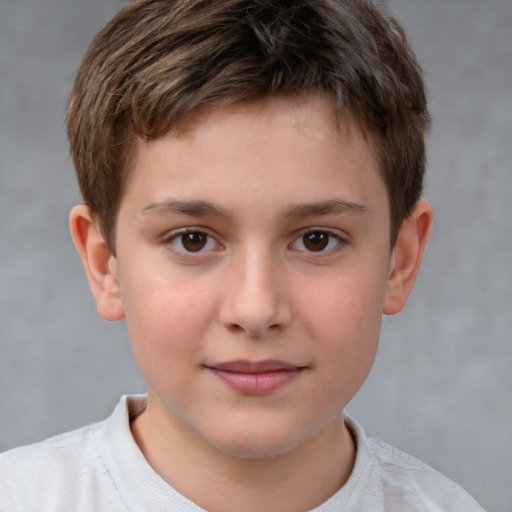 Joyful white child male with short  brown hair and brown eyes