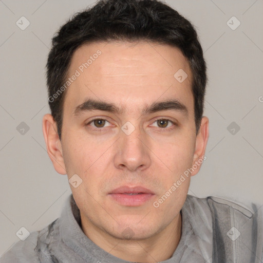 Neutral white adult male with short  black hair and brown eyes