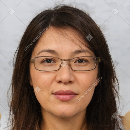 Joyful white adult female with long  brown hair and brown eyes