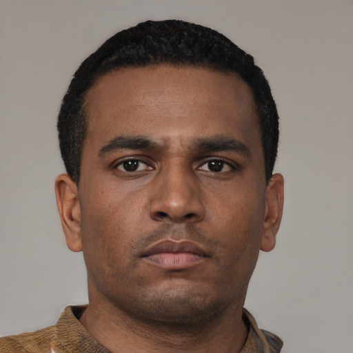 Neutral black young-adult male with short  brown hair and brown eyes