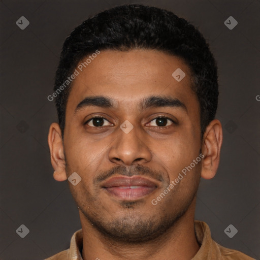 Joyful latino young-adult male with short  black hair and brown eyes