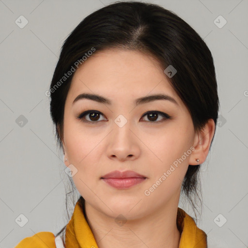 Joyful asian young-adult female with medium  brown hair and brown eyes