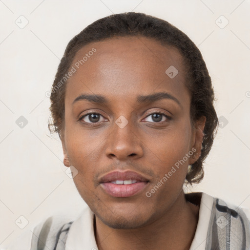 Neutral black young-adult female with short  brown hair and brown eyes