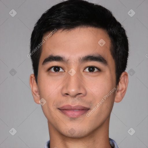 Joyful asian young-adult male with short  black hair and brown eyes