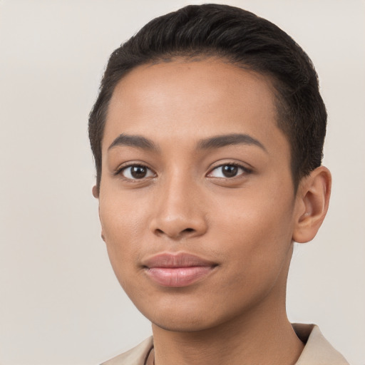 Joyful latino young-adult female with short  brown hair and brown eyes