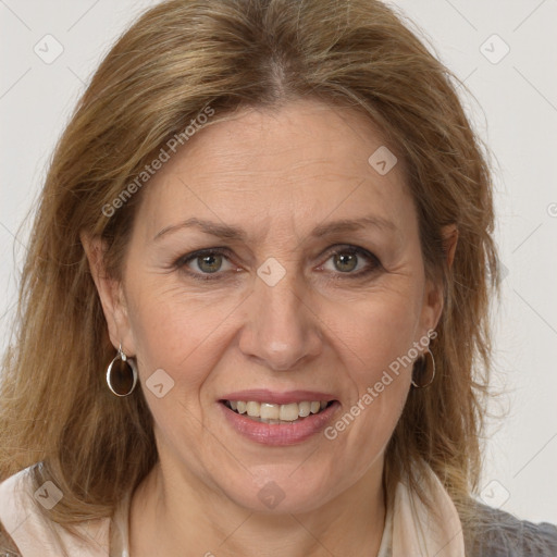 Joyful white adult female with medium  brown hair and brown eyes