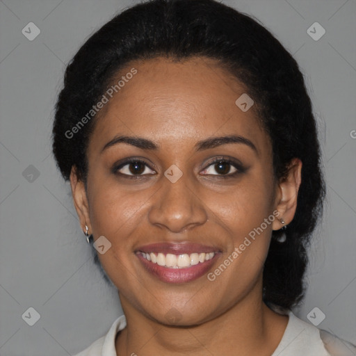 Joyful black young-adult female with medium  black hair and brown eyes