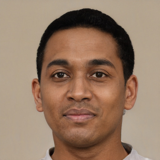 Neutral black young-adult male with short  black hair and brown eyes