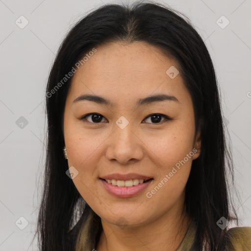 Joyful asian young-adult female with long  brown hair and brown eyes