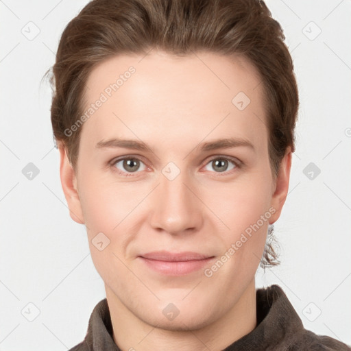 Joyful white young-adult female with short  brown hair and grey eyes