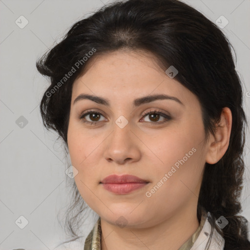 Joyful latino young-adult female with medium  brown hair and brown eyes