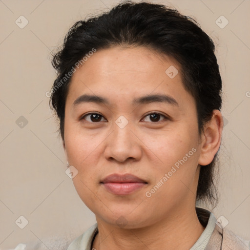 Joyful asian young-adult female with short  brown hair and brown eyes