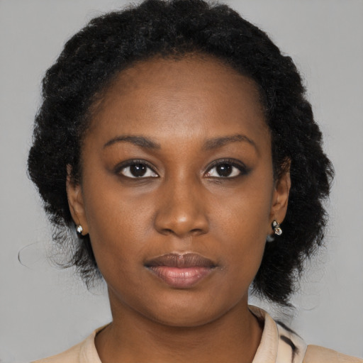 Neutral latino young-adult female with medium  brown hair and brown eyes