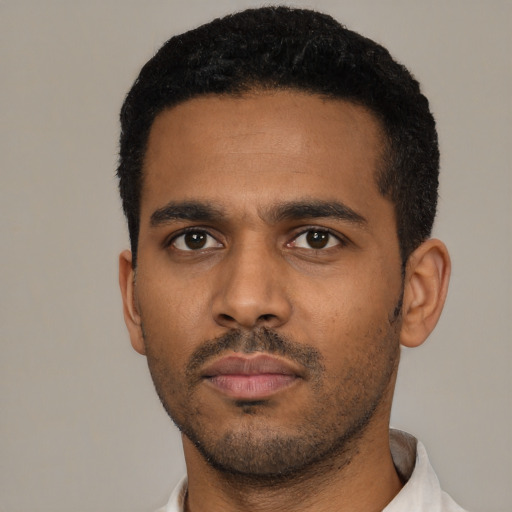 Neutral latino young-adult male with short  black hair and brown eyes