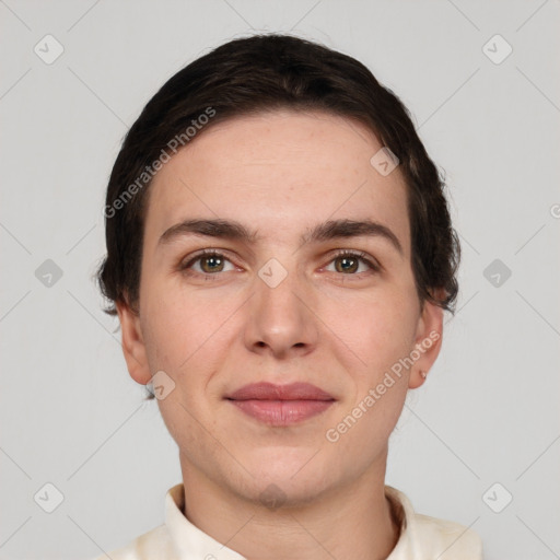 Joyful white young-adult female with short  brown hair and brown eyes