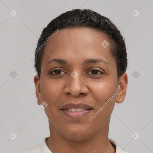 Joyful latino young-adult female with short  black hair and brown eyes