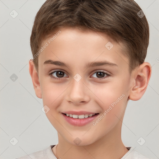 Joyful white child male with short  brown hair and brown eyes