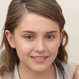 Joyful white child female with long  brown hair and brown eyes