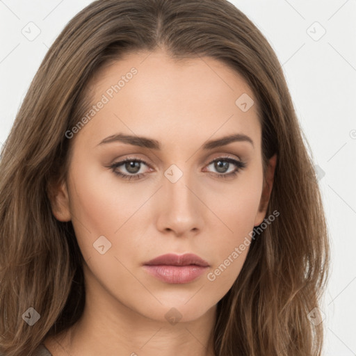 Neutral white young-adult female with long  brown hair and brown eyes