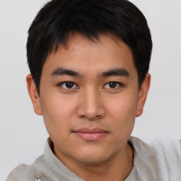 Neutral asian young-adult male with short  brown hair and brown eyes