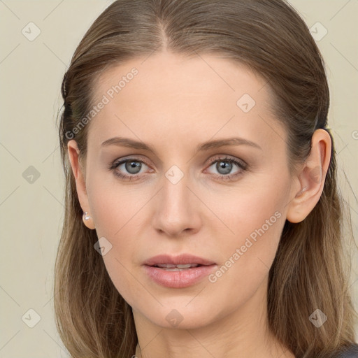 Joyful white young-adult female with long  brown hair and grey eyes