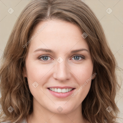 Joyful white young-adult female with long  brown hair and green eyes