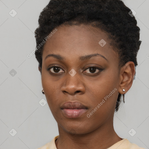 Neutral black young-adult female with short  black hair and brown eyes