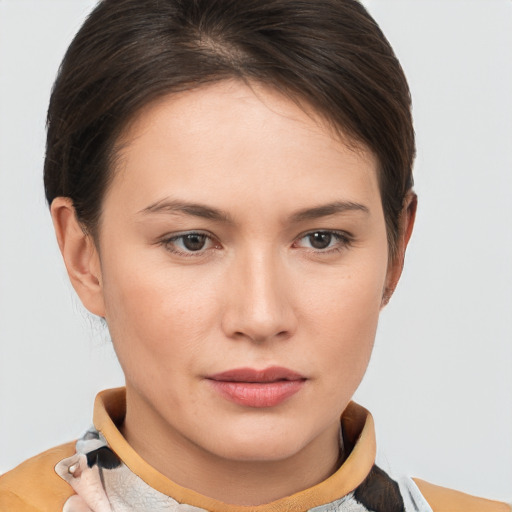 Neutral white young-adult female with short  brown hair and brown eyes