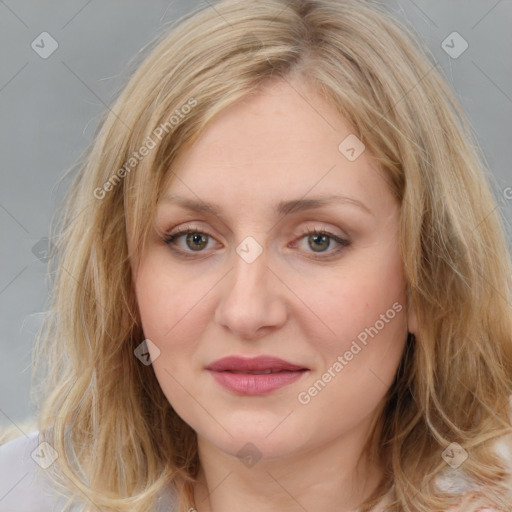 Joyful white young-adult female with medium  brown hair and blue eyes