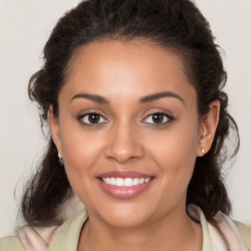 Joyful white young-adult female with medium  brown hair and brown eyes